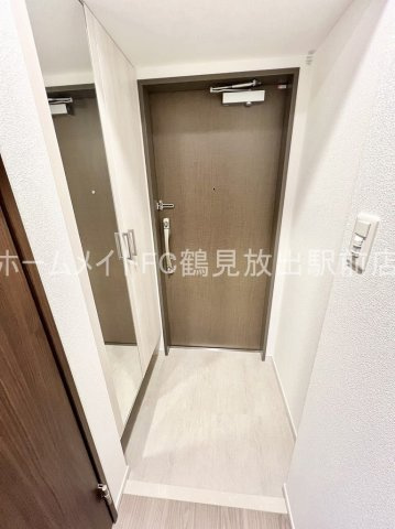 グランカーサ高井田の玄関