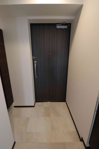 GENOVIA川崎鈴木町skygardenの玄関