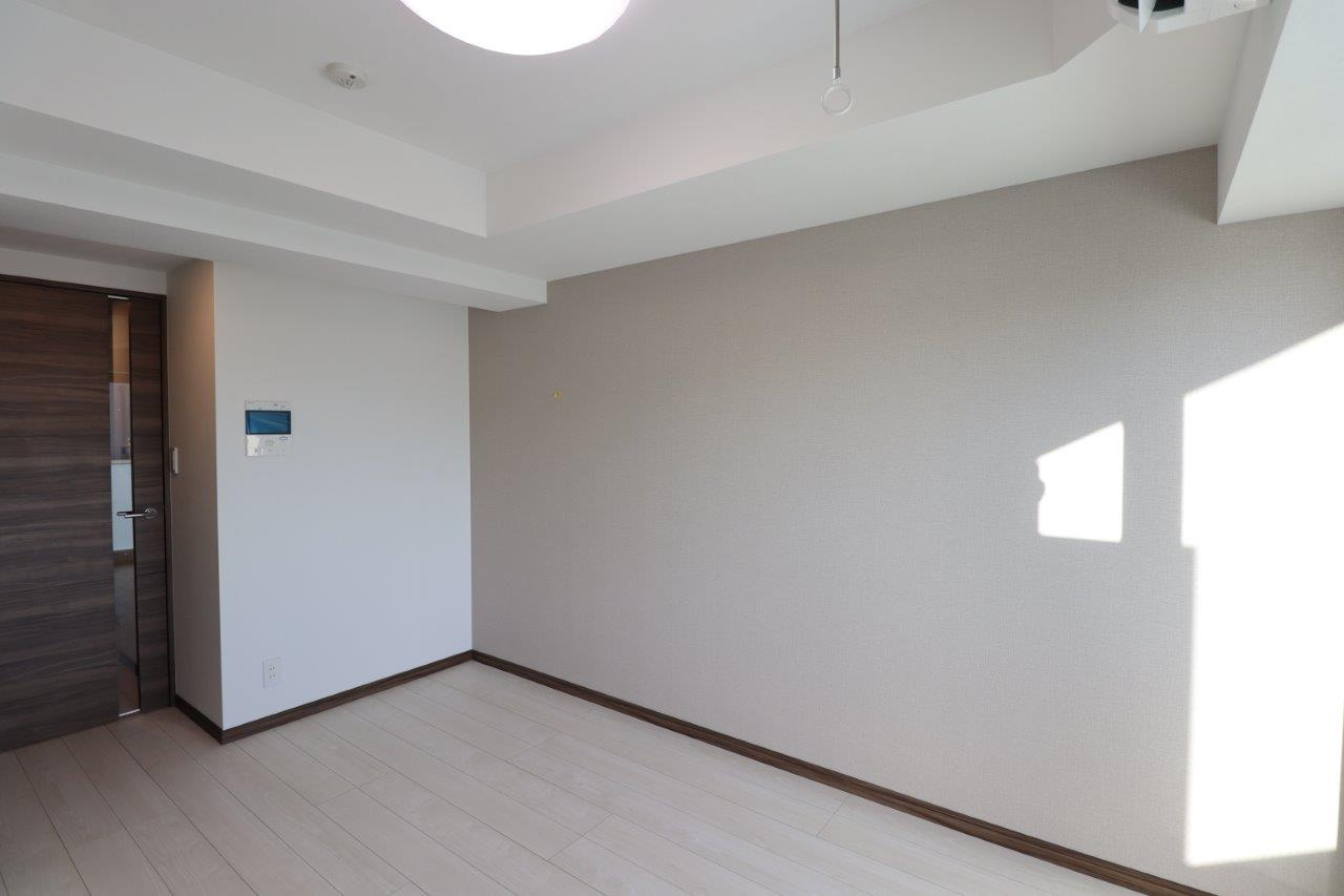 GENOVIA京成立石Ⅲskygardenの居間・リビング