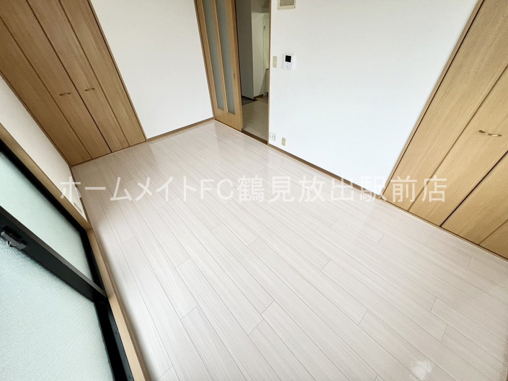 レジスコート今津中の洋室