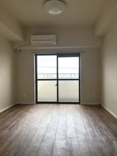 坂戸市日の出町の賃貸マンションの居間・リビング