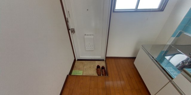 レジデンス希光の玄関