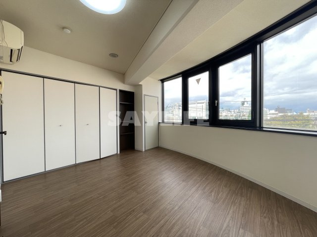 ホロン緑橋の洋室