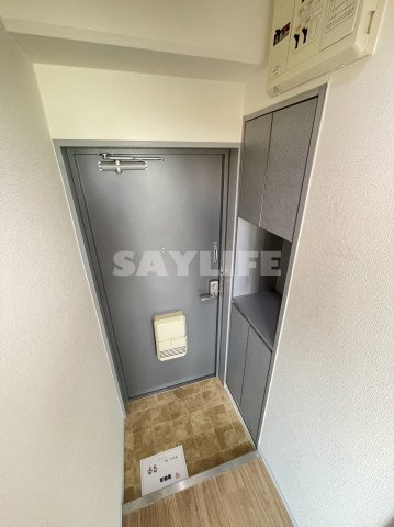 ホロン緑橋の玄関