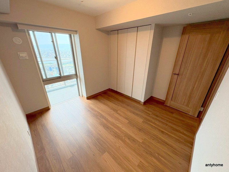 グランドメゾン新梅田タワー THE CLUB RESIDENCEの洋室