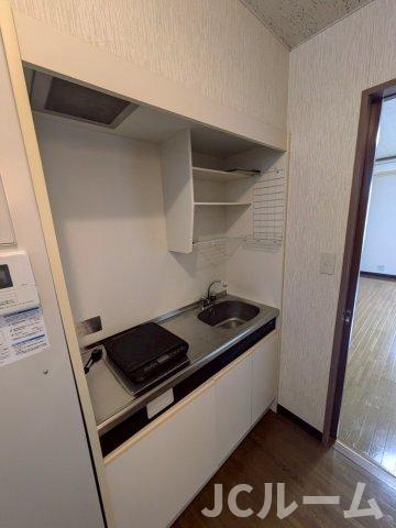 柏崎市穂波町のアパートのキッチン