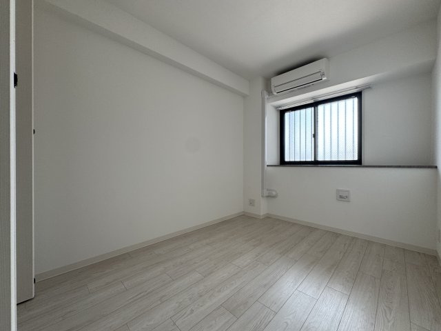 グリュックメゾンF豊中ⅩⅤの寝室