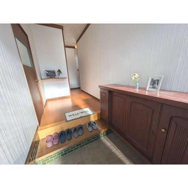 ラ・ファミリア-kawanone-の玄関