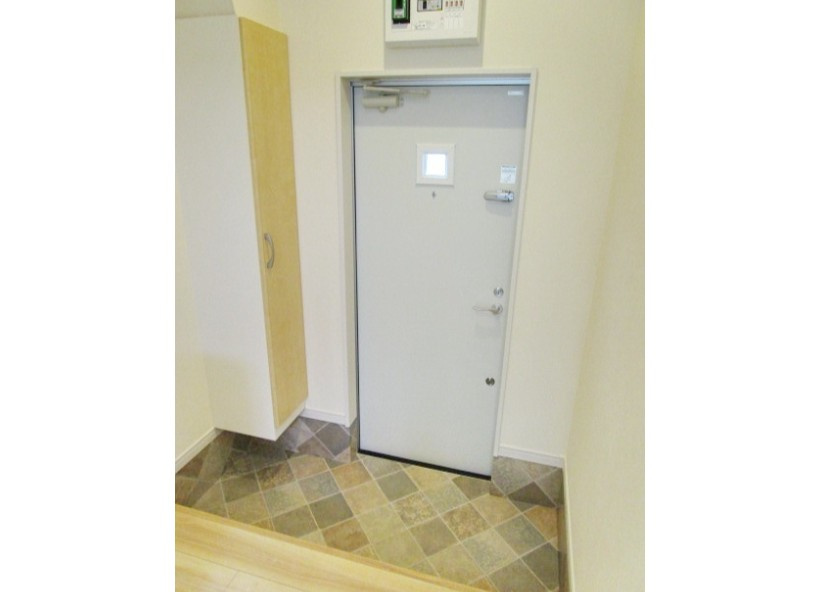 ミレニア草加住吉の玄関