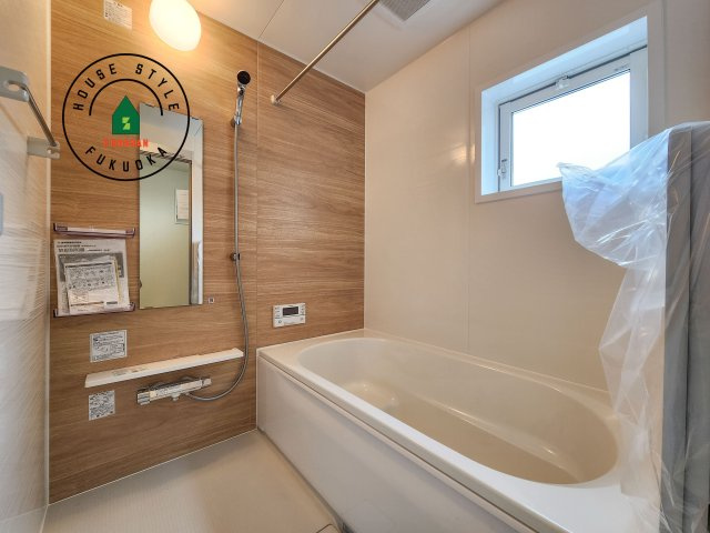 糟屋郡志免町王子2丁目第1-8棟（8号棟）の内観：施工例|1日の疲れを癒してくれる広々バスルーム。雨の日のお洗濯にも大活躍な浴室乾燥機付です！