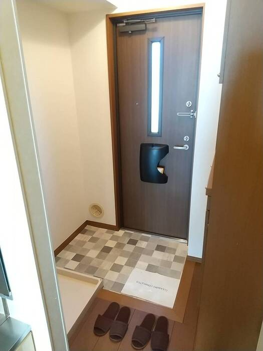 レーヴ平和台の玄関