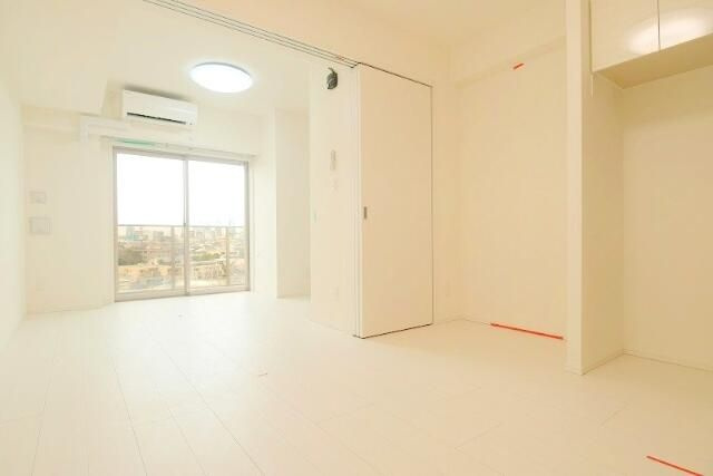 ＰＲＥＭＩＵＭ　ＣＵＢＥ　代々木上原の居間・リビング