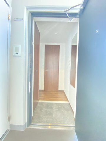 ファーストフィオーレ吹田レガーメの玄関