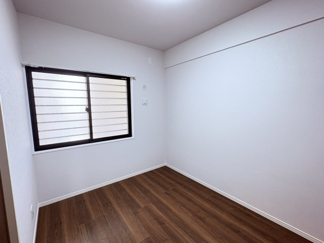 グランデ・プレミアムビスタ野嵩EASTの洋室