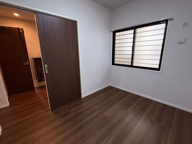 グランデ・プレミアムビスタ野嵩EASTの洋室