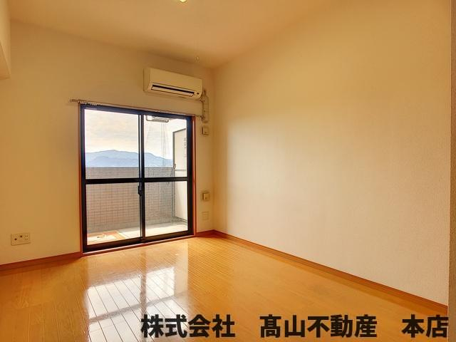 ロイヤルヒルズタワーの洋室