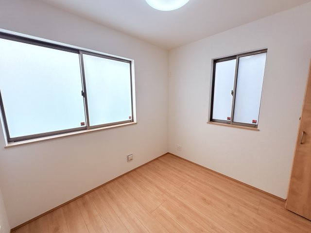 ハートフルタウンうるま市石川東恩納Ⅶ-A号棟　の洋室