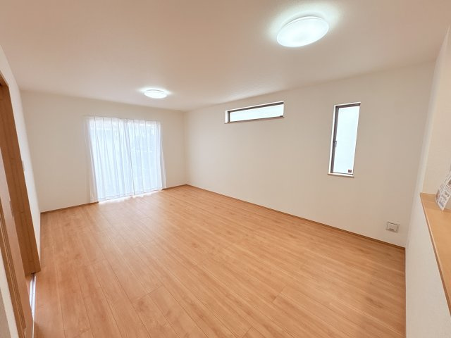 ハートフルタウンうるま市石川東恩納Ⅶ-A号棟　の居間・リビング