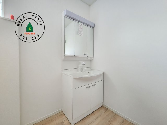 小郡市小郡第22-2棟（1号棟）の内観：施工例|洗面所は小さなプライベートスペース。歯磨き、洗顔と毎日施す個人空間。