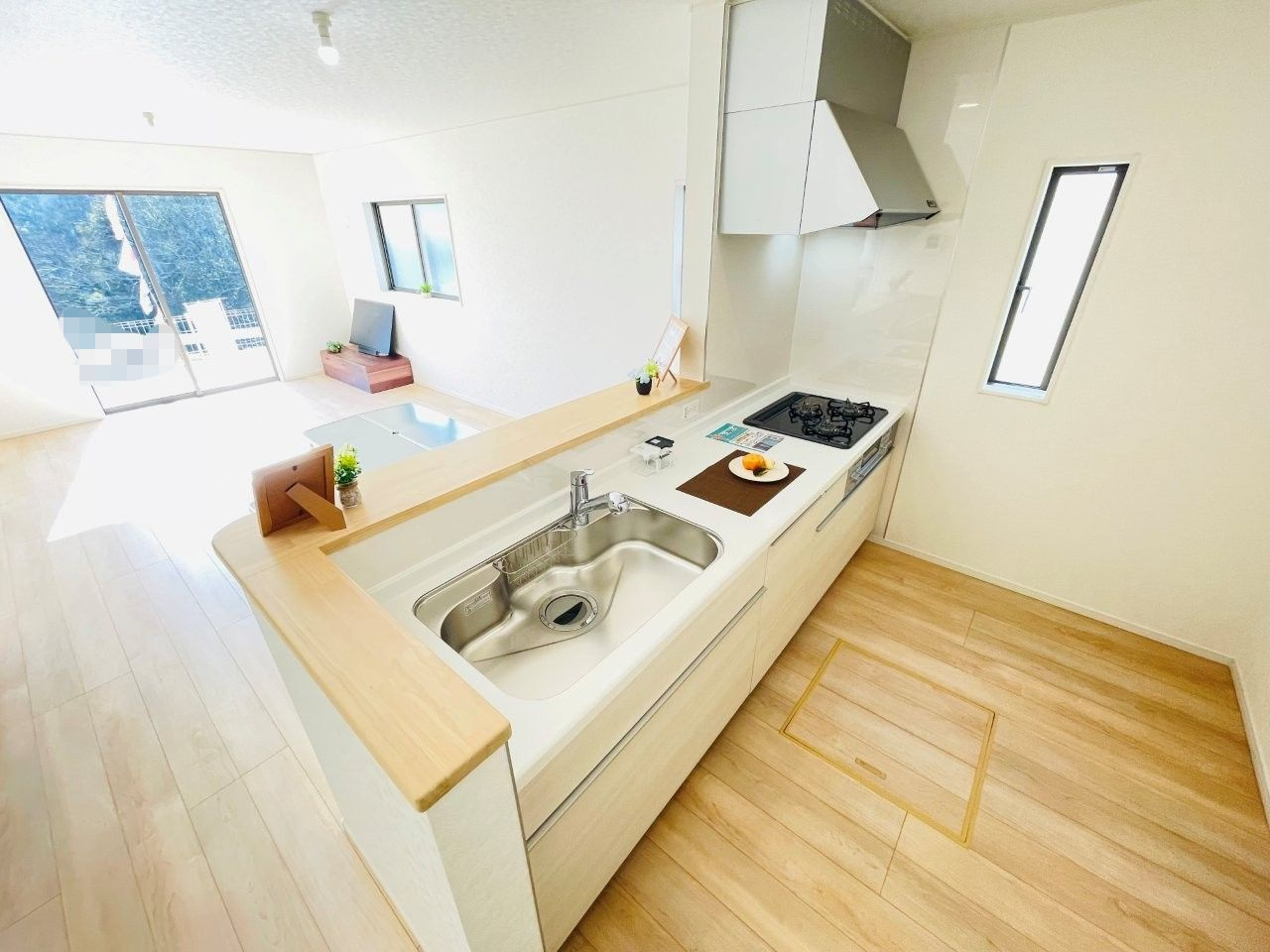 豊田市野見山町第5　新築分譲住宅　全2棟　1号棟のキッチン|浄水器一体型水栓です。