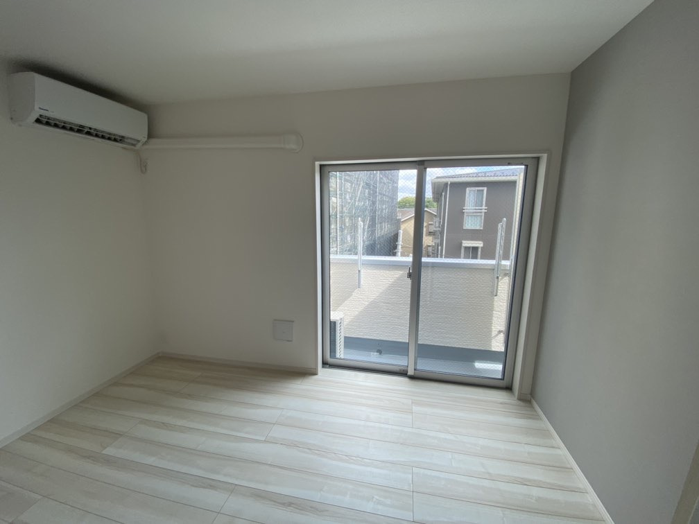 川崎市多摩区菅野戸呂のアパートの洋室