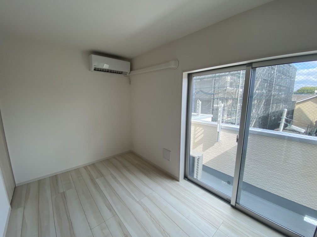 川崎市多摩区菅野戸呂のアパートの居間・リビング