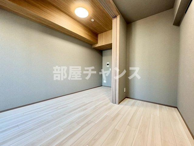 エステムコート名古屋新栄Ⅵ アートテラスの寝室