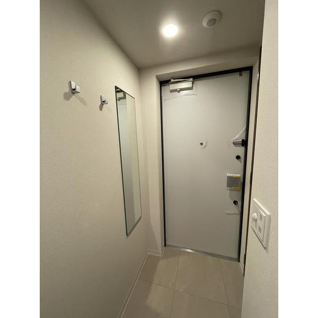 コンフォリア・リヴ本町WEST Qの玄関