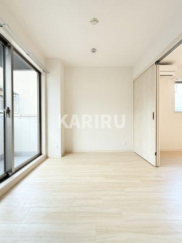 アルカンシェルコート緑橋の洋室