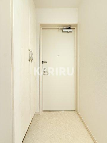 アルカンシェルコート緑橋の玄関