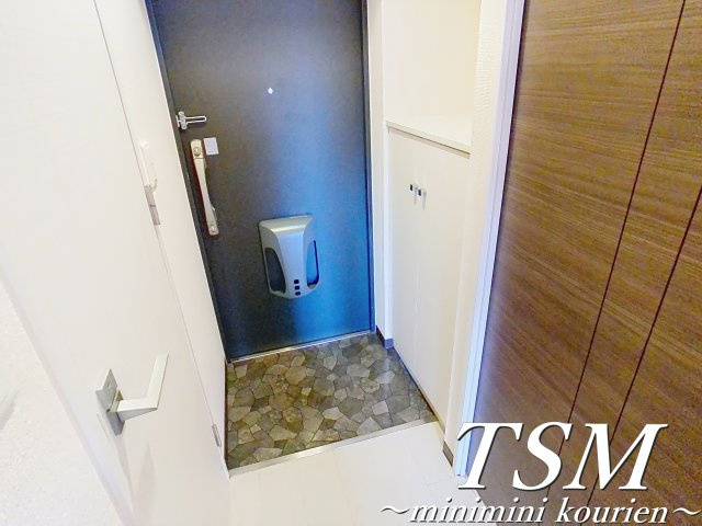 Ｍ’プラザ 香里六番館の玄関