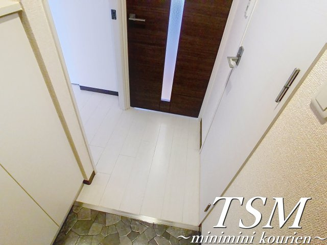 Ｍ’プラザ 香里六番館の玄関