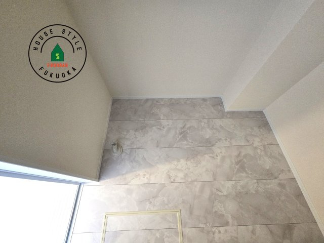 福津市西福間3丁目第1-2棟（1号棟）の内観：施工例|ランドリースペースとなります。広々して有効的にご使用できます。 