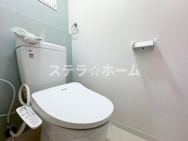 ユニーブル岡町のトイレ|落ち着いた色調のトイレです