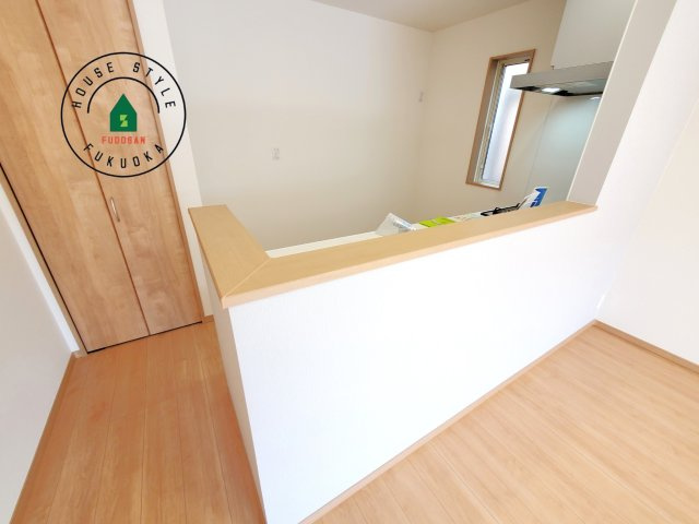 福岡市東区青葉6丁目第1-2棟（A号棟）の内観：施工例|キッチンから立ち込める香りが今日の料理を期待させます。