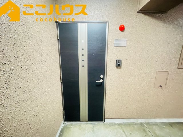ライオンズマンション泊の玄関