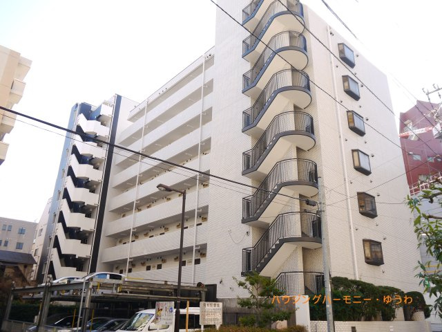 【外観】 | ライオンズマンション駒込六義園 | モダンでスタイリッシュな印象を与えるホワイトカラーを基調とした外観。