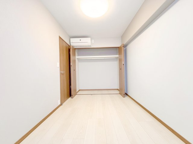 草加スカイハイツの洋室