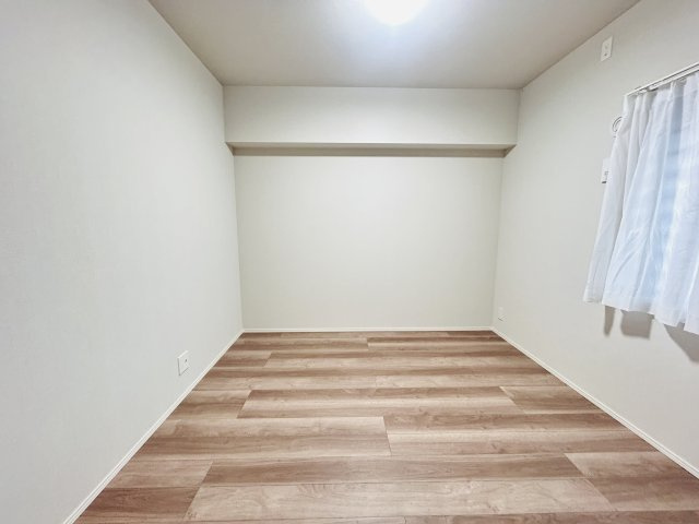 中頭郡北谷町北谷２丁目の中古マンションの洋室