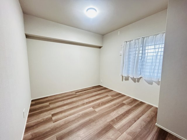 中頭郡北谷町北谷２丁目の中古マンションの洋室