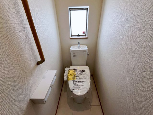 うるま市字川田の新築一戸建のトイレ