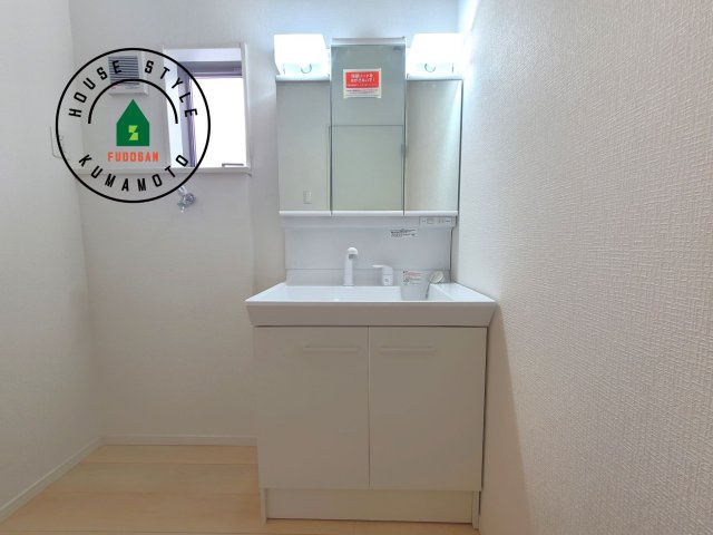 菊池市泗水町吉富第8₋3棟(2号棟)の内観：施工例|洗面所は小さなプライベートスペース。歯磨き、洗顔と毎日施す個人空間。