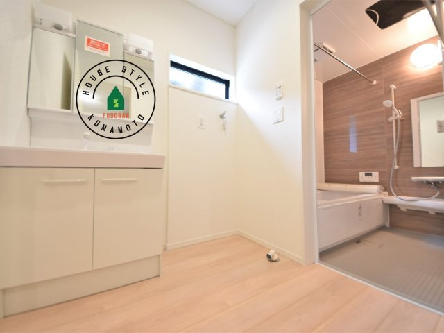 菊池市泗水町吉富第8₋3棟(1号棟)の内観：施工例|脱衣所、洗面所は小さなプライベートスペース。歯磨き、洗顔と毎日施す個人空間。