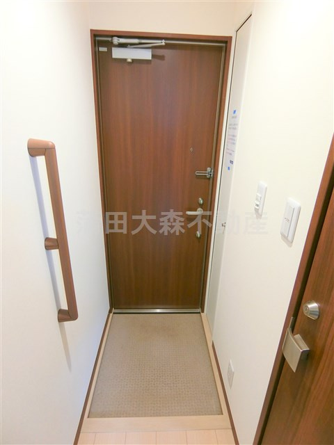 羽田道ソレイユの玄関