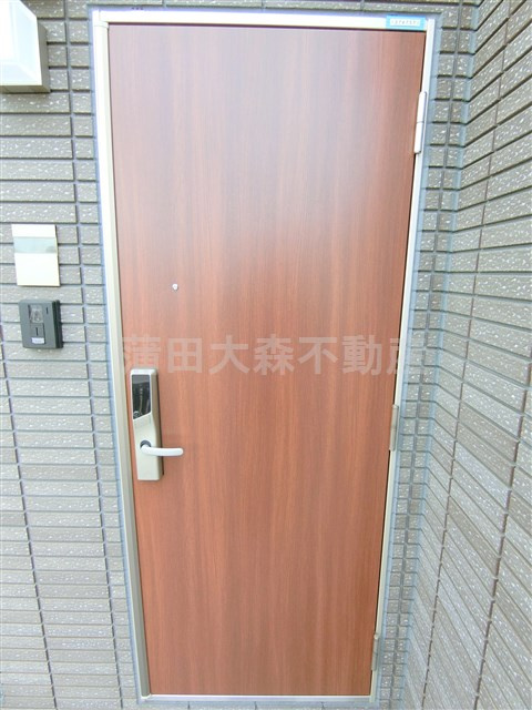 羽田道ソレイユの玄関