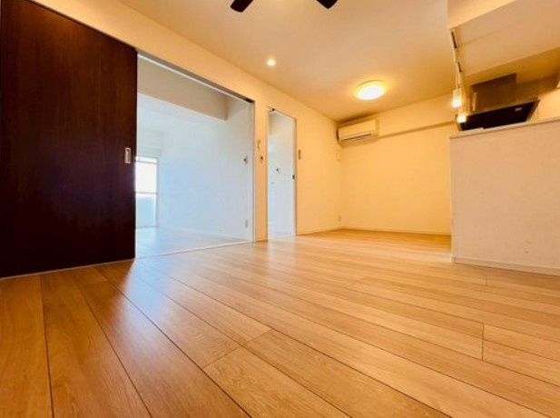 【居間・リビング】 | 池袋第２ヒルハイム | 間仕切りを開けば空間をさらに広く使えます！