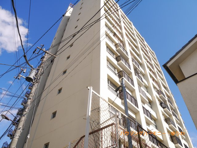 【外観】 | 新大塚共同住宅 | 住む人を映し出す洗練された佇まいは、いつまでも輝き続けながらいつしか街の風景に溶け込んでいきます。