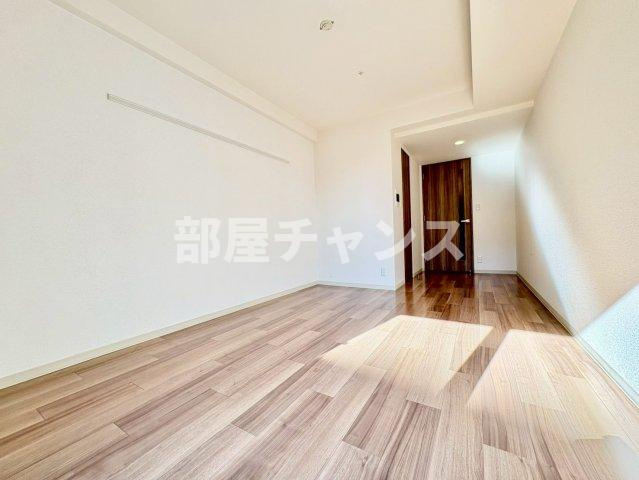 プレサンスジェネ鶴舞の寝室