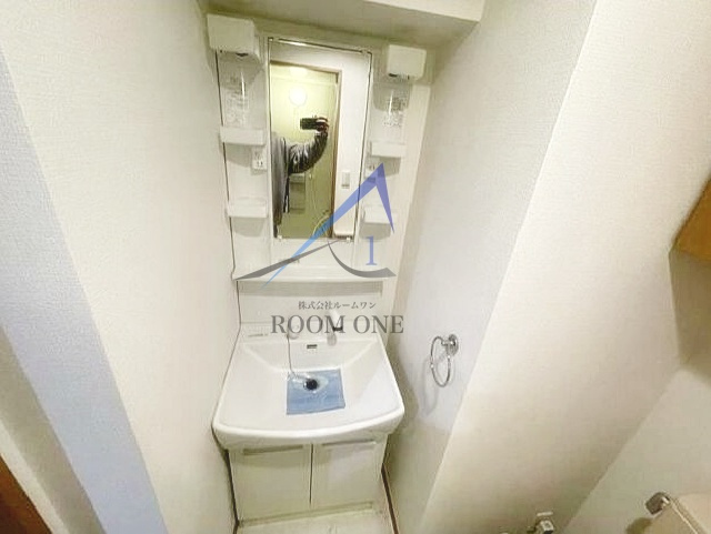 パレステュディオ西巣鴨の居間・リビング|洗面台です。