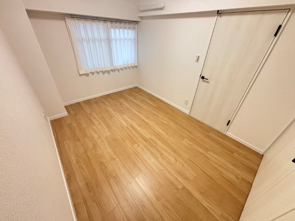 グリーンシティ弥生の洋室